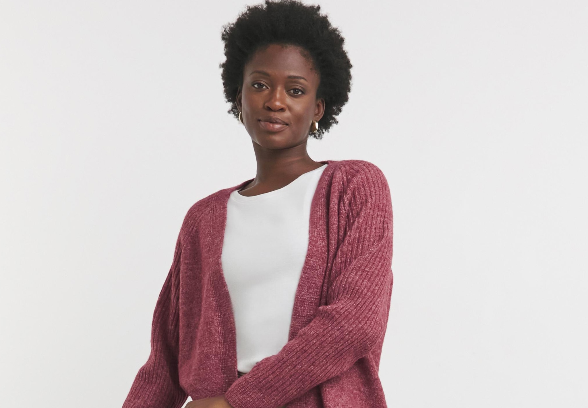 Lady wearing pink cardigan