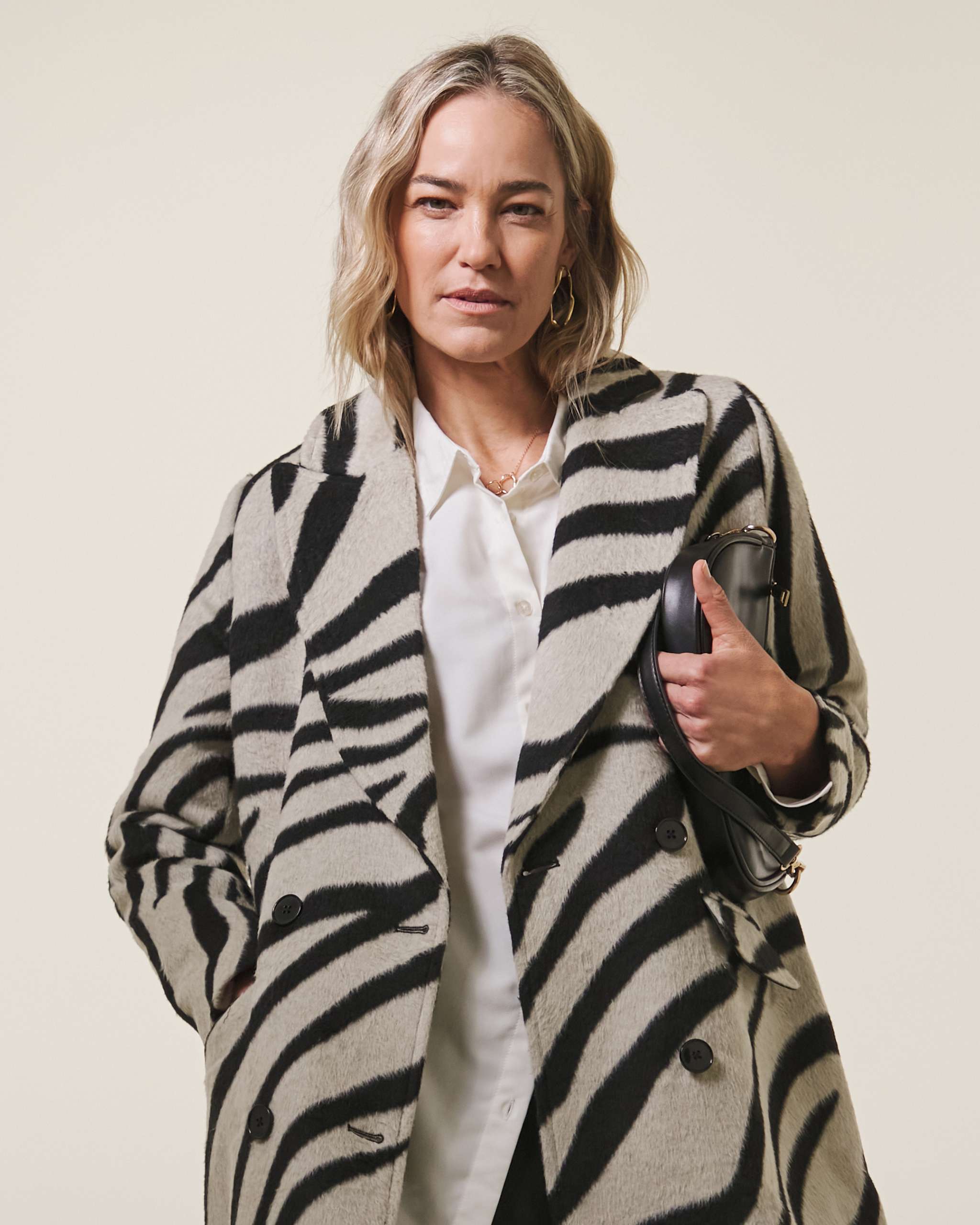 Lady in zebra patterned coat