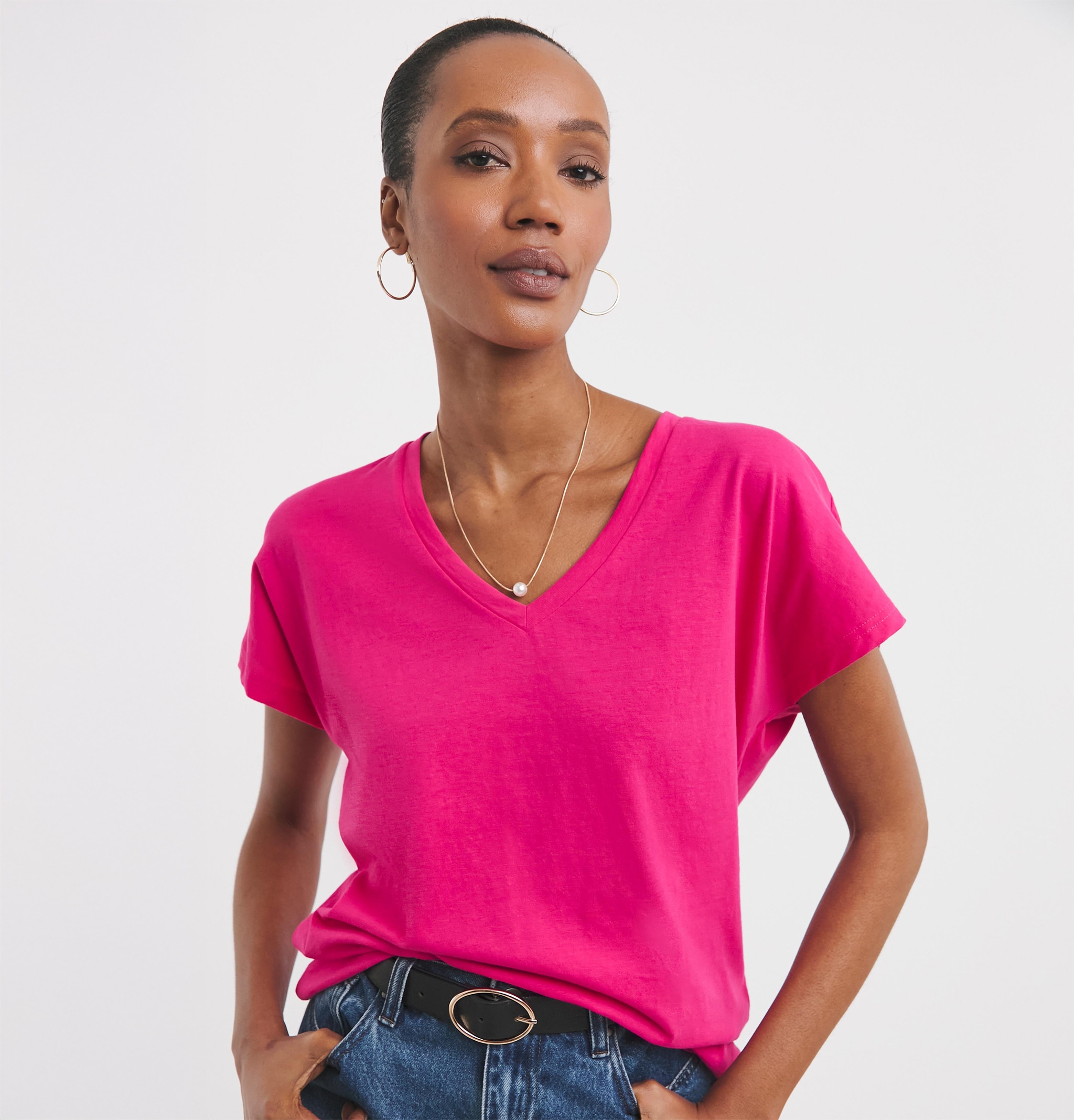 Lady wearing pink v neck T-shirt