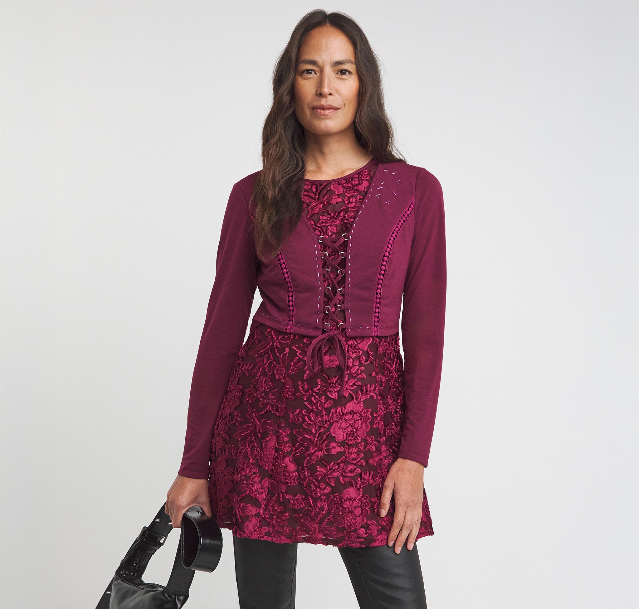 Lady wearing plum coloured tunic