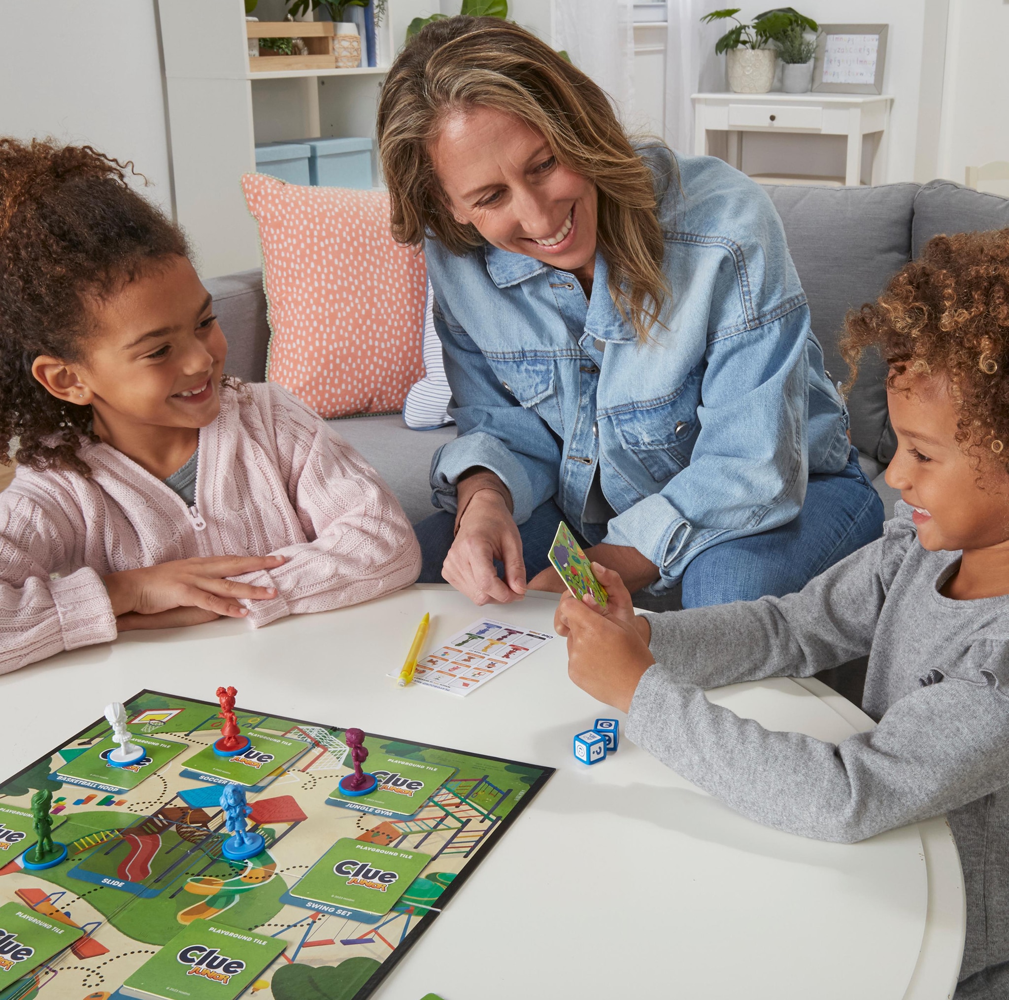 3 people playing with a board game