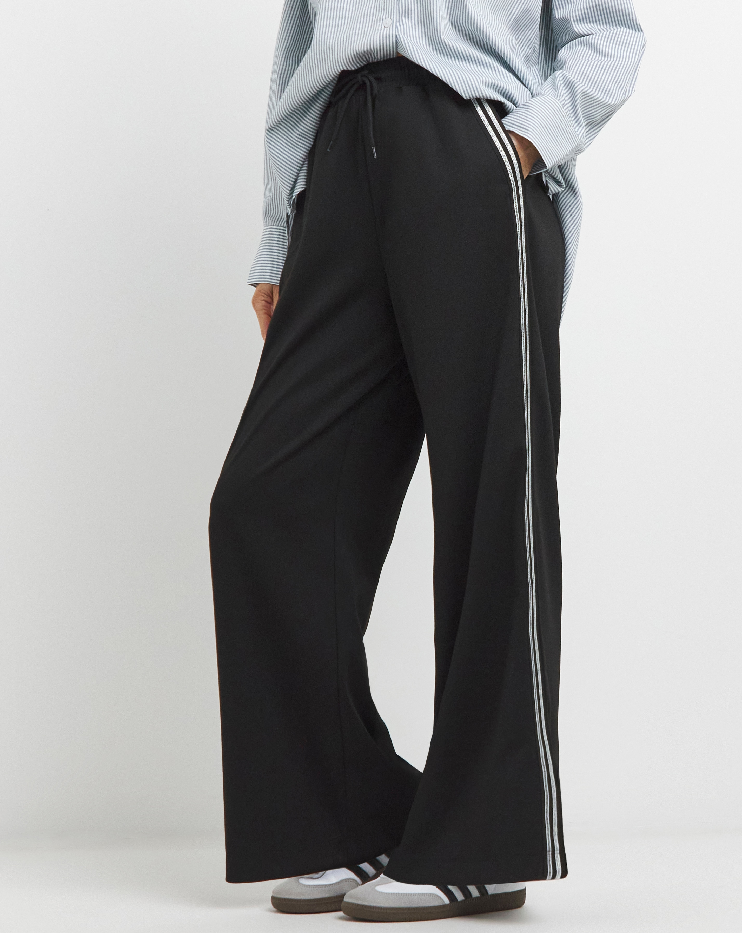 Black trousers with glitter side stripe online