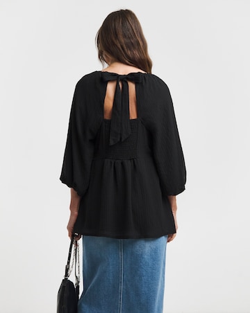 Black Exposed Back Textured Swing Top