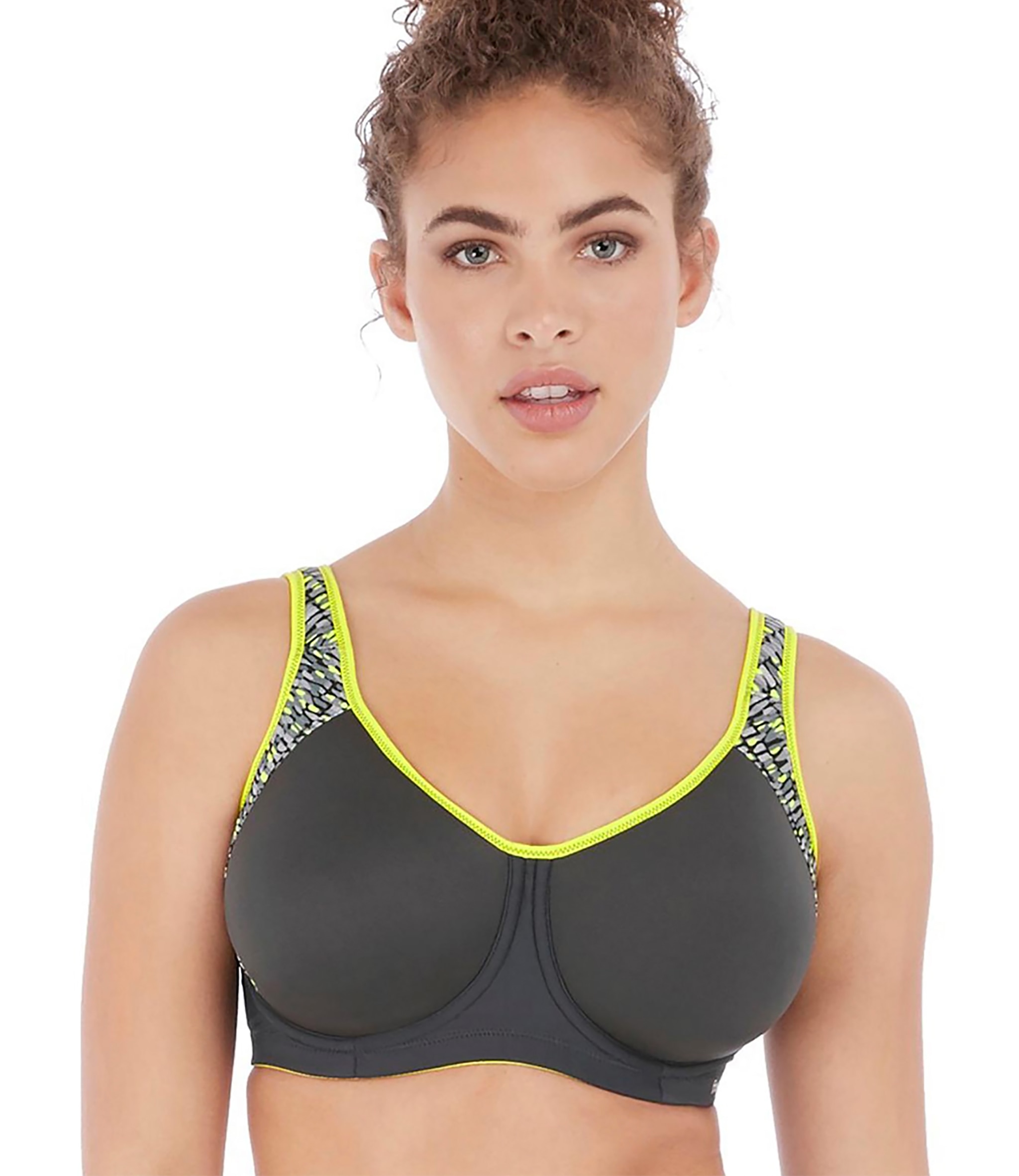 Woman wearing a dark grey sports bra